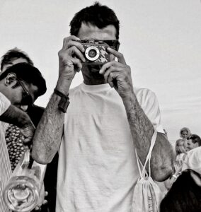 Candid shot turned into the photographer taking a picture of the photographe.r